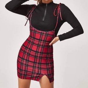 Plaid red overall dress.
